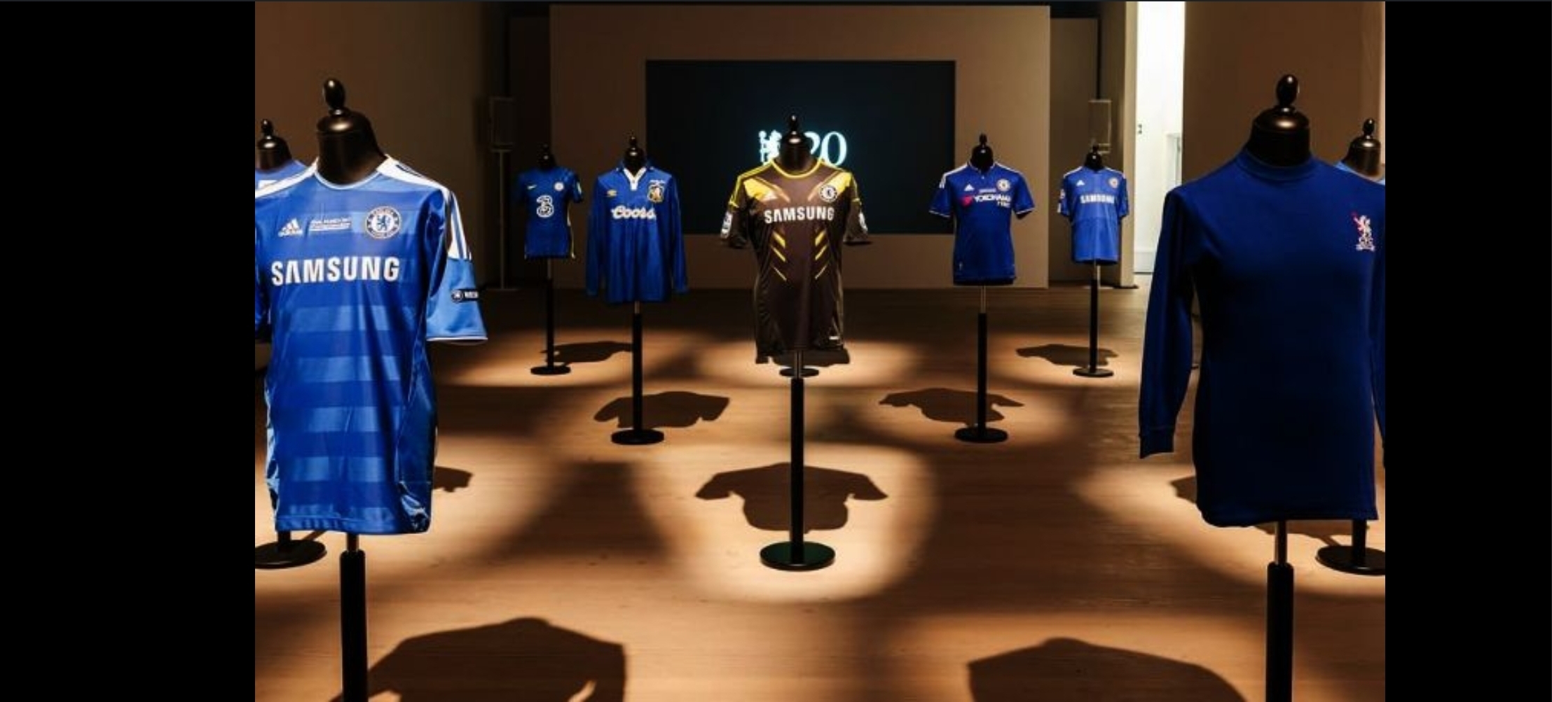 Chelsea FC heritage shirt exhibition with spotlighting