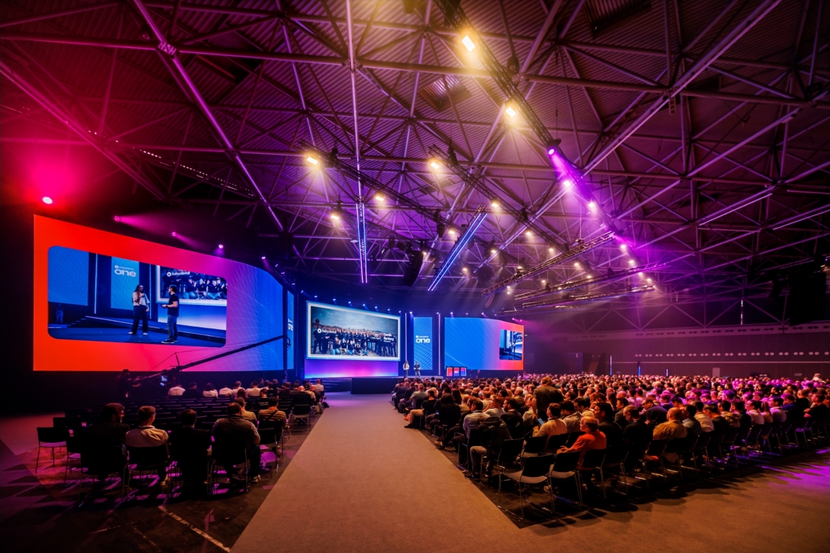 OutSystems ONE conference main stage and audience